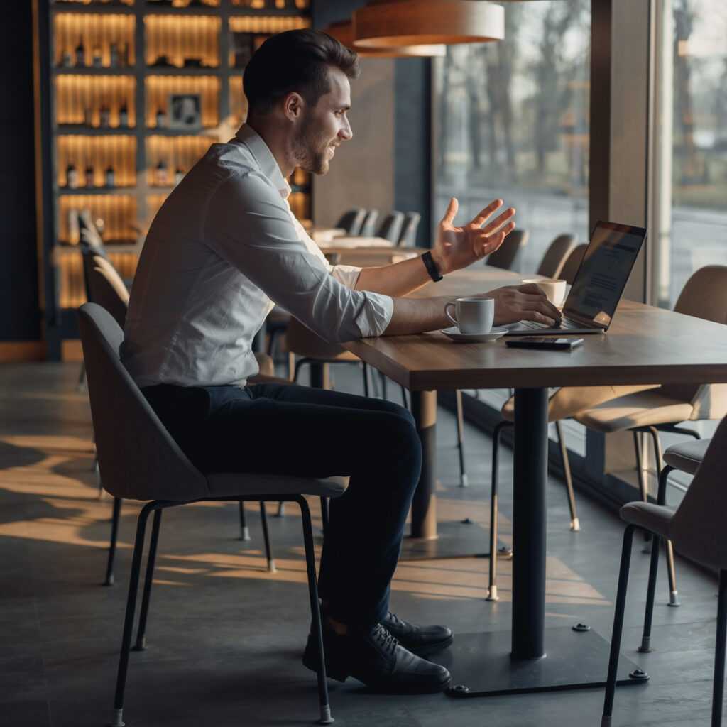 businessman-engaged-remote-work-modern-cafe