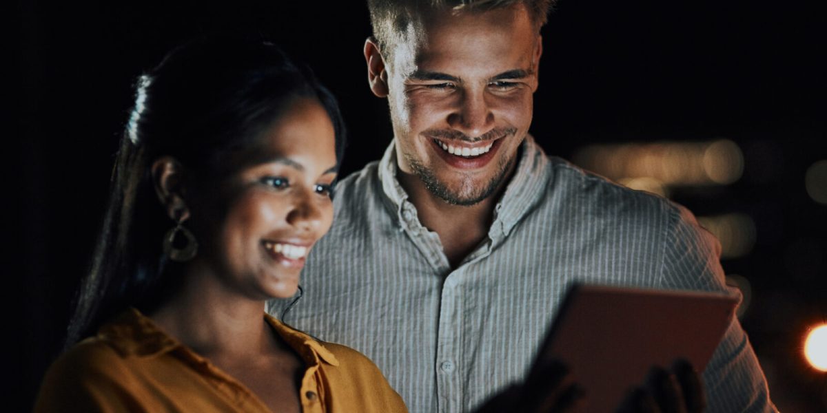 This app is perfect for what we need. Shot of two businesspeople